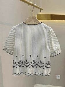 Iris embroidered top