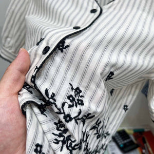 Iris embroidered top